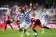 LONDON, ENGLAND - AUGUST 30: Joey Barton of QPR and Sebastian Larsson of Sunderland compete for the bsll during the Barclays Premier League match between Queens Park Rangers and Sunderland at Loftus Road on August 30, 2014 in London, England. (Photo by