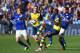 LEICESTER, ENGLAND - AUGUST 31: Yaya Sanogo of Arsenal controls the ball watched by (L-R) Dean Hammond of Leicester City, Aaron Ramsey of Arsenal, Liam Moore and Andy King of Leicester City during the Barclays Premier League match between Leicester City a