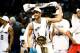 SAN ANTONIO, TX - JUNE 15: Manu Ginobili #20 of the San Antonio Spurs celebrates with the Larry O'Brien trophy after defeating the Miami Heat in Game Five of the 2014 NBA Finals at the AT&T Center on June 15, 2014 in San Antonio, Texas. NOTE TO USER: User