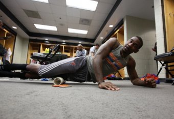 CHICAGO, IL - MARCH 2: Amar'e Stoudemire #1 of the New York Knicks stretches before the game against the Chicago Bulls on March 02, 2014 at the United Center in Chicago, Illinois. NOTE TO USER: User expressly acknowledges and agrees that, by downloading