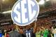 Dec 7, 2013; Atlanta, GA, USA; Auburn Tigers cornerback Chris Davis (11) holds up the SEC sign after the 2013 SEC Championship game against the Missouri Tigers at Georgia Dome. The Auburn Tigers defeated the Missouri Tigers 59-42. Mandatory Credit: Kevin