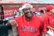 Jun 25, 2014; Anaheim, CA, USA; Los Angeles Angels batting coach Don Baylor (25) wears a Santa hat that will be given to all fans on the promotional night,