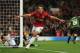 MANCHESTER, ENGLAND - OCTOBER 23: Javier Hernandez of Manchester United celebrates scoring his team's third goal to make the score 3-2 during the UEFA Champions League Group H match between Manchester United and SC Braga at Old Trafford on October 23, 20