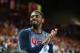 BILBAO, SPAIN - AUGUST 31: Kyrie Irving #10 of the USA Basketball Men's National Team cheers for his teammates during a game against the Turkey Basketball Men's National Team during the 2014 FIBA World Cup at Bizkaia Arena in Bilbao Exhibition Centre on A