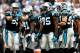 CHARLOTTE, NC - DECEMBER 22: Luke Kuechly #59 of the Carolina Panthers huddles with the defense during their game against the New Orleans Saints at Bank of America Stadium on December 22, 2013 in Charlotte, North Carolina. (Photo by Streeter Lecka/Gett