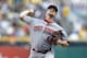 Aug 29, 2014; Pittsburgh, PA, USA; Cincinnati Reds starting pitcher Mike Leake (44) delivers a pitch against the Pittsburgh Pirates during the first inning at PNC Park. Mandatory Credit: Charles LeClaire-USA TODAY Sports