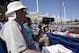 Mar 3, 2014; Phoenix, AZ, USA; A scout uses a radar gun during spring training between the Milwaukee Brewers and Chicago Cubs at Maryvale Baseball Park. Mandatory Credit: Rick Scuteri-USA TODAY Sports