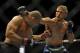 May 24, 2014; Las Vegas, NV, USA; Renan Barao (red) dodges a punch from TJ Dillashaw (blue) during their UFC 173 bantamweight championship bout at MGM Grand Garden Arena. Dillashaw won the bout by way of TKO. Mandatory Credit: Stephen R. Sylvanie-USA TOD