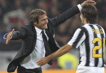 TURIN, ITALY - OCTOBER 02: Juventus FC manager Antonio Conte celebrates the victory with Andrea Pirlo at the end of the Serie A match between Juventus FC and AC Milan on October 2, 2011 in Turin, Italy. (Photo by Marco Luzzani/Getty Images)