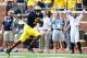 Aug 30, 2014; Ann Arbor, MI, USA; Michigan Wolverines wide receiver Devin Funchess (1) runs the ball for a touchdown in the first quarter against the Appalachian State Mountaineers at Michigan Stadium. Mandatory Credit: Rick Osentoski-USA TODAY Sports