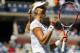 NEW YORK, NY - SEPTEMBER 03: Ekaterina Makarova of Russia celebrates after defeating Victoria Azarenka of Belarus in their women's singles quarterfinal match on Day Ten of the 2014 US Open at the USTA Billie Jean King National Tennis Center on September
