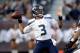 OAKLAND, CA - AUGUST 28: Quarterback Russell Wilson #3 of the Seattle Seahawks in action against the Oakland Raiders at O.co Coliseum on August 28, 2014 in Oakland, California. (Photo by Ezra Shaw/Getty Images)