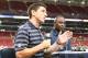 Andrew Siciliano and Marshall Faulk before a recent Rams exhibition game.