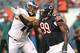 CHICAGO, IL - AUGUST 08: Lamarr Houston #99 of the Chicago Bears rushes against Allen Barbre #76 of the Philadelphia Eagles during a preseason game at Soldier Field on August 8, 2014 in Chicago, Illinois. (Photo by Jonathan Daniel/Getty Images)