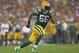 GREEN BAY, WI - AUGUST 22: Julius Peppers #56 of the Green Bay Packers rushes against the Oakland Raiders during a preseason game at Lambeau Field on August 22, 2014 in Green Bay, Wisconsin. The Packers defeated the Raiders 31-21. (Photo by Jonathan Dan