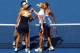 NEW YORK, NY - SEPTEMBER 04: Kimiko Date-Krumm of Japan and Barbora Zahlavora Strycova of Czech Republic meet Ekaterina Makarova and Elena Vesnina of Russia after losing their women's doubles semifinal match on Day Eleven of the 2014 US Open at the USTA