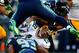 SEATTLE - SEPTEMBER 04: Quarterback Aaron Rodgers #12 of the Green Bay Packers is sacked by Michael Bennett #72 of the Seattle Seahawks at Century Link Field on September 4, 2014 in Seattle, Washington. (Photo by Jonathan Ferrey/Getty Images)