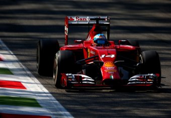 MONZA, ITALY - SEPTEMBER 06: Fernando Alonso of Spain and Ferrari drives during Qualifying ahead of the F1 Grand Prix of Italy at Autodromo di Monza on September 6, 2014 in Monza, Italy. (Photo by Paul Gilham/Getty Images)