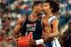 13 AUG 1994: MARKALONZO MOURNING OF THE USA DREAM TEAM HOLDS OFF PANAGIOTIS FASSOULAS OF GREECE DURING THE FIRST HALF OF THEIR SEMI-FINAL CLASH WITH GREECE AT THE SKYDOME STADIUM IN TORONTO, ONTARIO, CANADA. Mandatory Credit: Doug Pensinger/ALLSPORT