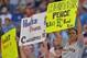 Aug 9, 2014; Kansas City, MO, USA; San Francisco Giants right fielder Hunter Pence (8) fans hold up troll signs during the game against the Kansas City Royals at Kauffman Stadium. The Royals won 5-0. Mandatory Credit: Denny Medley-USA TODAY Sports