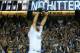 LOS ANGELES, CA - JUNE 18: Pitcher Clayton Kershaw #22 of the Los Angeles Dodgers reacts (foreground) after pitching a no-hitter against the Colorado Rockies as fans jubilate in the background after the MLB game at Dodger Stadium on June 18, 2014 in Los