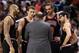 Feb 19, 2014; Toronto, Ontario, CAN; Chicago Bulls forward Carlos Boozer (5) and forward Mike Dunleavy (34) and center Joakim Noah (13) and guard Kirk Hinrich (12) listen to head coach Tom Thibodeau against the Toronto Raptors at Air Canada Centre. The Bu