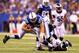 INDIANAPOLIS, IN - SEPTEMBER 15: Quarterback Andrew Luck #12 of the Indianapolis Colts runs with the ball against the Philadelphia Eagles during a game at Lucas Oil Stadium on September 15, 2014 in Indianapolis, Indiana. (Photo by Andy Lyons/Getty Images