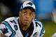 CHARLOTTE, NC - AUGUST 08: Greg Hardy #76 of the Carolina Panthers watches from the bench during the fourth quarter of a loss to the Buffalo Bills at Bank of America Stadium on August 8, 2014 in Charlotte, North Carolina. Buffalo won 20-18. (Photo by Gr