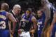14 Mar 2002: Head coach Phil Jackson, forward Devean George #3, and several other Los Angeles Lakers huddle during the NBA game against the Golden State Warriors at the Arena in Oakland in Oakland, California. The Lakers defeated the Raptors 110-102.\ NO