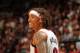 MIAMI, FL - OCTOBER 19: Michael Beasley #8 of the Miami Heat looks on while smiling against the San Antonio Spurs during a game on October 19, 2013 at American Airlines Arena in Miami, Florida. NOTE TO USER: User expressly acknowledges and agrees that, by