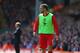 LIVERPOOL, ENGLAND - AUGUST 17: Rickie Lambert of Liverpool looks on from the sidelines during the Barclays Premier League match between Liverpool and Southampton at Anfield on August 17, 2014 in Liverpool, England. (Photo by Alex Livesey/Getty Images)