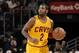 CLEVELAND, OH - JANUARY 26: Kyrie Irving #2 of the Cleveland Cavaliers brings the ball up the court against the Phoenix Suns at The Quicken Loans Arena on January 26, 2014 in Cleveland, Ohio. NOTE TO USER: User expressly acknowledges and agrees that, by