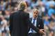 MANCHESTER, ENGLAND - SEPTEMBER 21: Jose Mourinho of Chelsea speaks with Manuel Pellegrini of Manchester City during the Barclays Premier League match between Manchester City and Chelsea at Etihad Stadium on September 21, 2014 in Manchester, England. (Ph