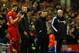 LIVERPOOL, ENGLAND - JANUARY 01: Steven Gerrard of Liverpool prepares to replace Iago Aspas of Liverpool during the Barclays Premier League match between Liverpool and Hull City at Anfield on January 1, 2014 in Liverpool, England. (Photo by Clive Brunsk