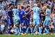 MANCHESTER, ENGLAND - SEPTEMBER 21: Pablo Zabaleta of Manchester City is separated from Diego Costa of Chelsea by his team-mates during the Barclays Premier League match between Manchester City and Chelsea at the Etihad Stadium on September 21, 2014 in