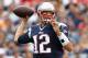FOXBORO, MA - SEPTEMBER 21: Tom Brady #12 of the New England Patriots throws the ball during the second quarter against the Oakland Raiders at Gillette Stadium on September 21, 2014 in Foxboro, Massachusetts. (Photo by Jim Rogash/Getty Images)