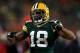 GREEN BAY, WI - JANUARY 05: Randall Cobb #18 of the Green Bay Packers celebrates after a first down catch in the fourth quarter against the San Francisco 49ers during their NFC Wild Card Playoff game at Lambeau Field on January 5, 2014 in Green Bay, Wisc