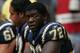 HOUSTON - SEPTEMBER 12: Roman Oben #72 of the San Diego Chargers sits on the sidelines during the game against the Houston Texans on September 12, 2004 at Reliant Stadium in Houston, Texas. The Chargers won 27-20. (Photo by Ronald Martinez/Getty Images)