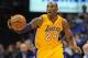 Dec 13, 2013; Oklahoma City, OK, USA; Los Angeles Lakers shooting guard Kobe Bryant (24) dribbles the ball against the Oklahoma City Thunder during the second quarter at Chesapeake Energy Arena. Mandatory Credit: Mark D. Smith-USA TODAY Sports