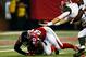 ATLANTA, GA - SEPTEMBER 18: Defensive end Stansly Maponga #90 of the Atlanta Falcons recovers a loose ball against quarterback Mike Glennon #8 of the Tampa Bay Buccaneers during a game at the Georgia Dome on September 18, 2014 in Atlanta, Georgia. (Photo