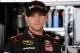 DOVER, DE - SEPTEMBER 27: Denny Hamlin, driver of the #11 FedEx Freight Toyota, stands in the garage area during practice for the NASCAR Sprint Cup Series AAA 400 at Dover International Speedway on September 27, 2014 in Dover, Delaware. (Photo by Jared