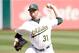 OAKLAND, CA - SEPTEMBER 24: Jon Lester #31 of the Oakland Athletics pitches against the Los Angeles Angels of Anaheim at O.co Coliseum on September 24, 2014 in Oakland, California. (Photo by Ezra Shaw/Getty Images)