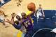 MEMPHIS, TN - DECEMBER 17: Kobe Bryant #24 of the Los Angeles Lakers grabs a rebound against the Memphis Grizzlies on December 17, 2013 at FedExForum in Memphis, Tennessee. NOTE TO USER: User expressly acknowledges and agrees that, by downloading and or u