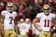 ATLANTA, GA - JANUARY 20: Quarterbacks Colin Kaepernick #7 and quarterback Alex Smith #11 of the San Francisco 49ers warm up before taking on the Atlanta Falcons in the NFC Championship game at the Georgia Dome on January 20, 2013 in Atlanta, Georgia. (
