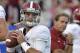 Former Alabama QB AJ McCarron (left) and head coach Nick Saban