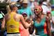 KEY BISCAYNE, FL - MARCH 27: Serena Williams of the United States shakes hands at the net after her straight sets victory against Maria Sharapova of Russia during their semi final round match during day 11 at the Sony Open at Crandon Park Tennis Cente on