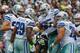 SEATTLE, WA - OCTOBER 12: Running back DeMarco Murray #29 of the Dallas Cowboys celebrates with teammates after rushing for the winning touchdown in a 30-23 win over the Seattle Seahawks at CenturyLink Field on October 12, 2014 in Seattle, Washington. (