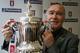 LONDON - FEBRUARY 15: Former Chelsea player Ron Harris poses with the FA Cup ahead of this weekend's fourth round of the FA Cup at a Nationwide branch on February 15, 2006 in London, England. (Photo by Paul Gilham/Getty Images)