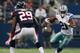 ARLINGTON, TX - OCTOBER 05: Joseph Randle #21 of the Dallas Cowboys carries the ball as Andre Hal #29 of the Houston Texans tries to position for the tackle in the first half at AT&T Stadium on October 5, 2014 in Arlington, Texas. (Photo by Tom Penningt