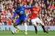 MANCHESTER, ENGLAND - OCTOBER 05: Romelu Lukaku of Everton competes with Patrick McNair of Manchester United during the Barclays Premier League match between Manchester United and Everton at Old Trafford on October 5, 2014 in Manchester, England. (Photo